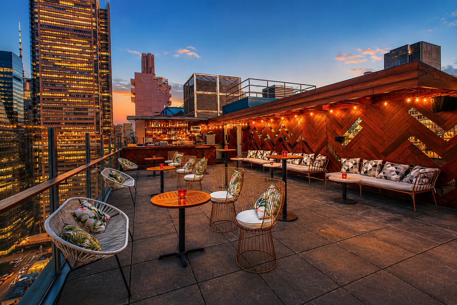 High Bar NYC rooftop terrace at sunset overlooking Midtown skyline